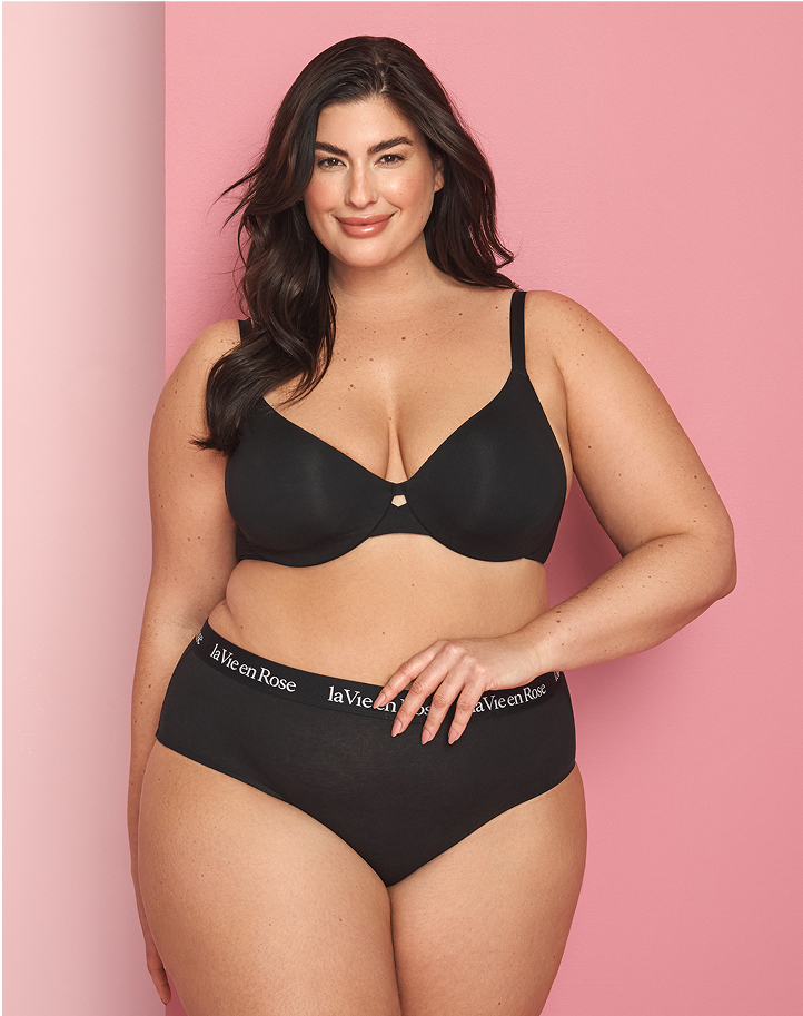 Plus-size model wearing a black bra and panty