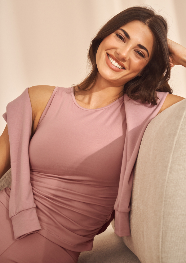 Model wearing a pink short-sleeved lounge top