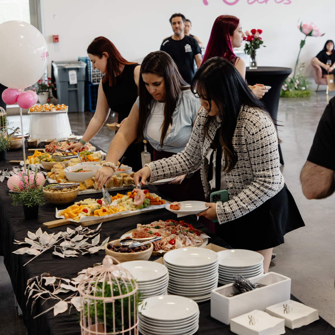 Photos from our summer swimwear event highlighting featured activities, themed decor, and event setup