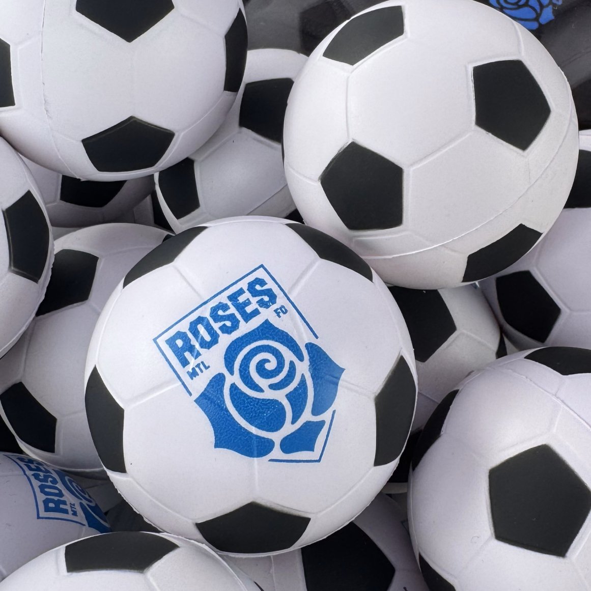 Photos from the Roses Montreal soccer match showing players wearing la Vie en Rose pajamas.