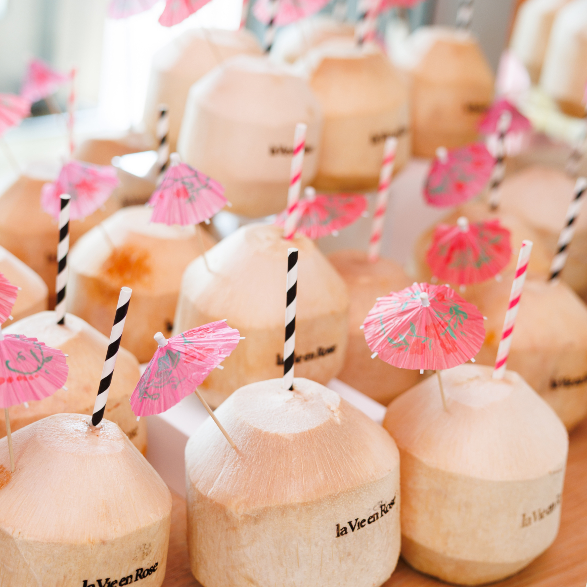 Photos from our summer swimwear event highlighting featured activities, themed decor, and event setup