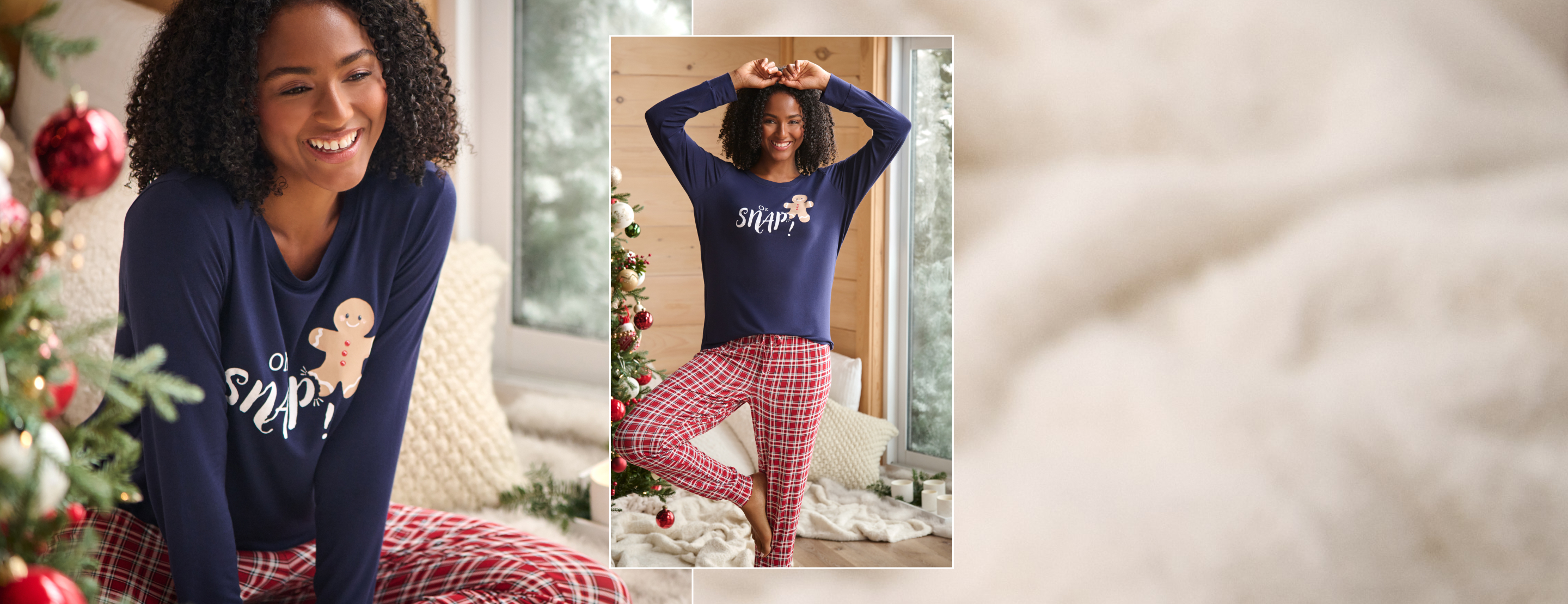 Model wearing festive navy and red pajamas