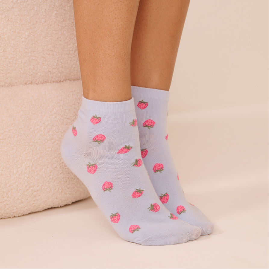 Blue socks with a strawberry pattern