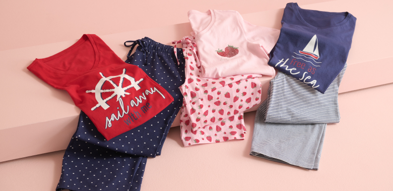 folded sets—blue, green with flamingos, pink with watermelon